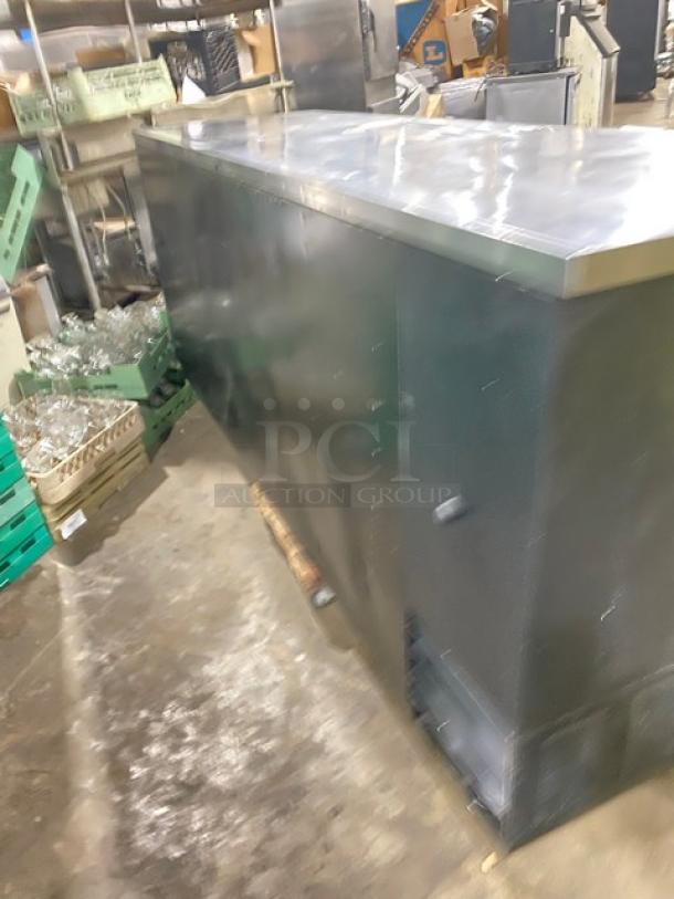 True TDD-4 kegerator, 3-door, black powder-coated, 90", stainless steel worktop, drip tray, 115V, 1 phase, serial 7296168.
