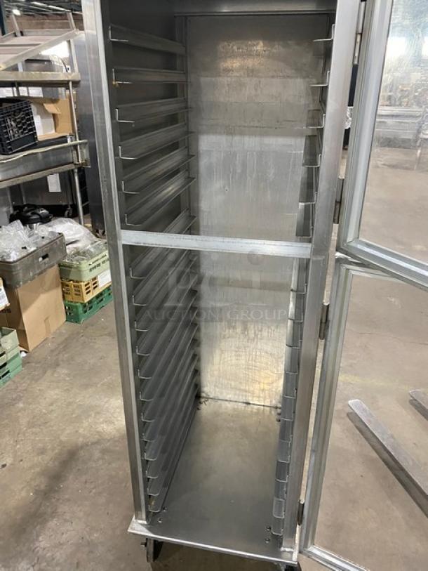 Lockwood CA72-RR18-S-R display/transport cabinet with clear half door, built-in pan slides, metal finish, on casters.