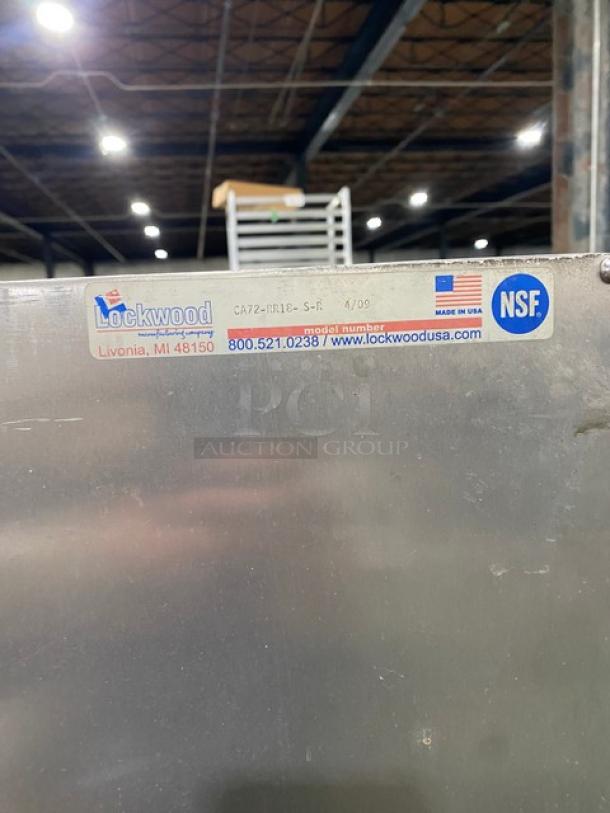 Lockwood CA72-RR18-S-R display/transport cabinet, stainless steel, built-in pan slides, on casters, model label visible.
