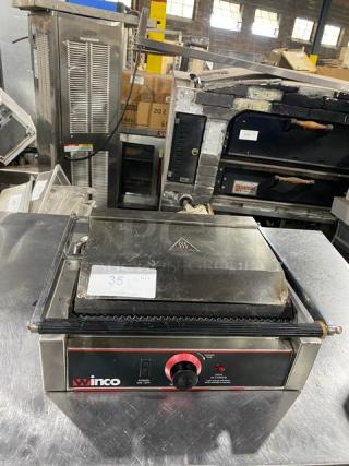 Winco EPG-1 commercial stainless steel panini grill with grooved grates, electric powered, 120V, good condition.