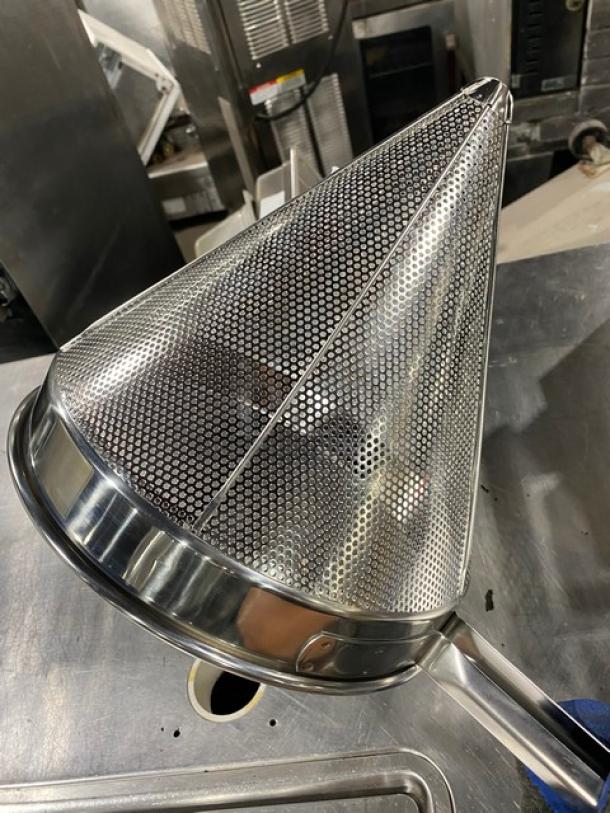 Brand new Update International 12" stainless steel coarse mesh China cap strainer, model CC-12C, on metal surface.