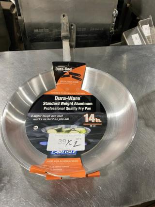 Brand new Carlisle Dura-Ware Series 14" aluminum fry pan, model 60914RS, with black grip handle, tags showing specifications.