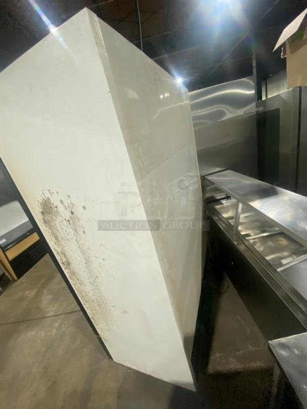 True GDM-49 commercial refrigerator, double glass swing doors, poly-coated wire racks, beverage organizers, 115V, showing signs of wear.