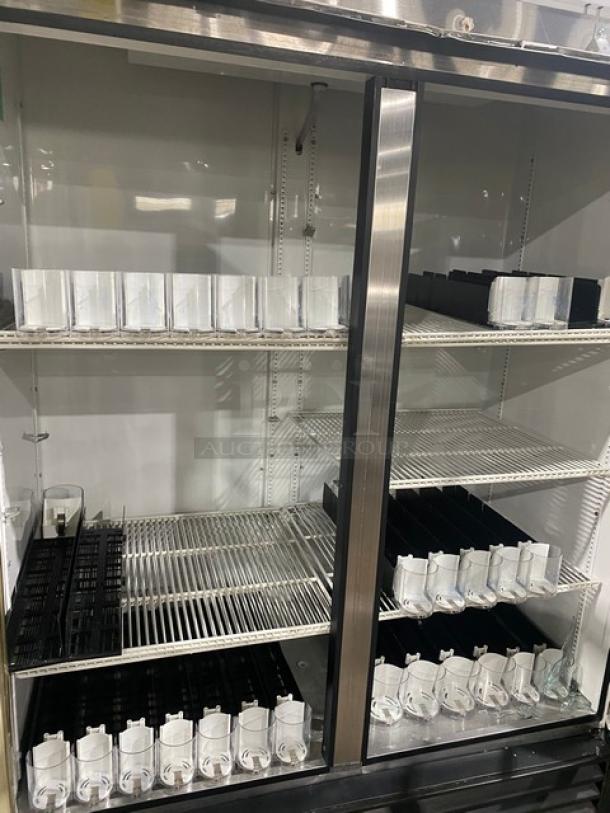 True GDM-49 commercial fridge, double glass swing doors, poly-coated wire racks, beverage organizers, 115V, 1 Phase.