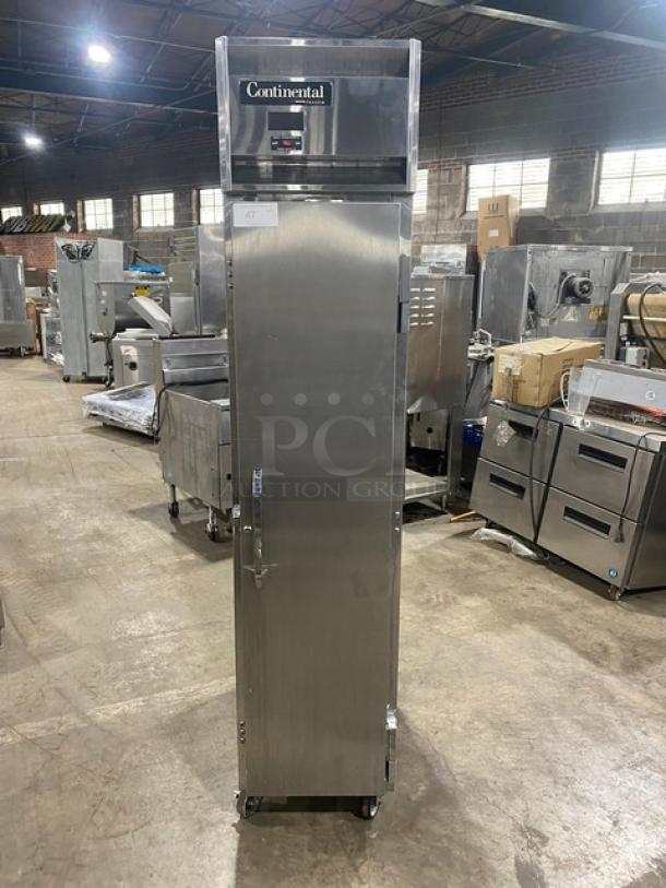 Continental Slim Series One Door Reach-In Freezer, Model DL1F6E, Serial 15459781, 115V, 1 Phase, on casters.