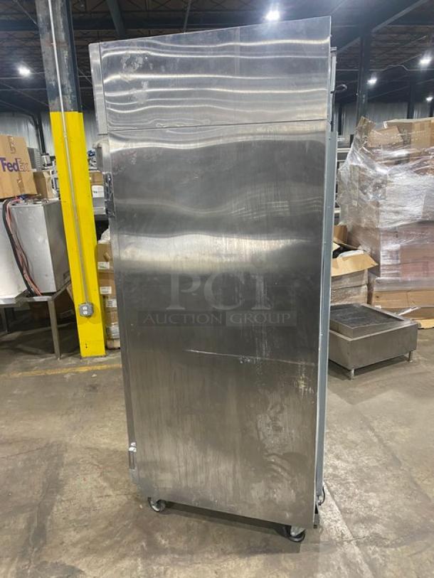 Continental Slim Series DL1F6E One Door Reach-In Freezer, stainless steel, model DL1F6E, 115V, on casters.