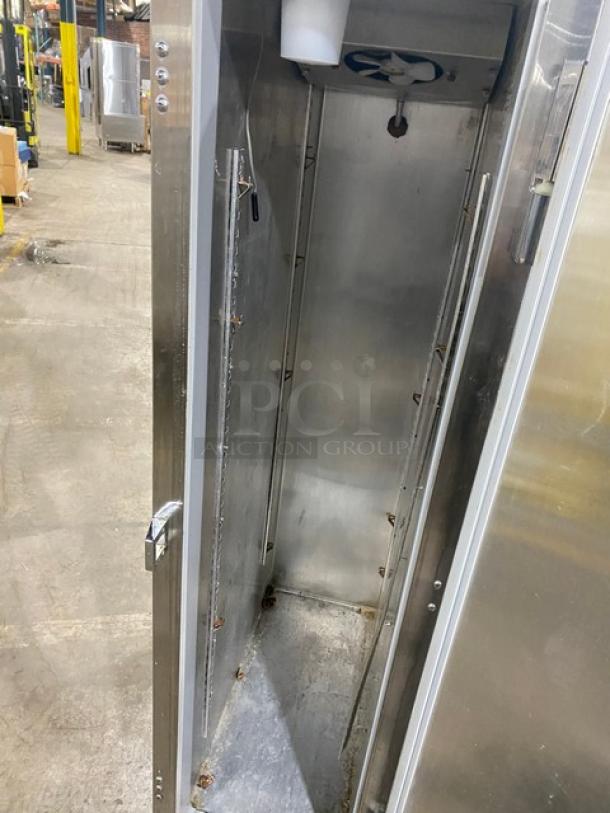 Continental Slim Series One Door Reach In Freezer, model DL1F6E, on casters, stainless steel interior, 115V, 1 Phase, in used condition.