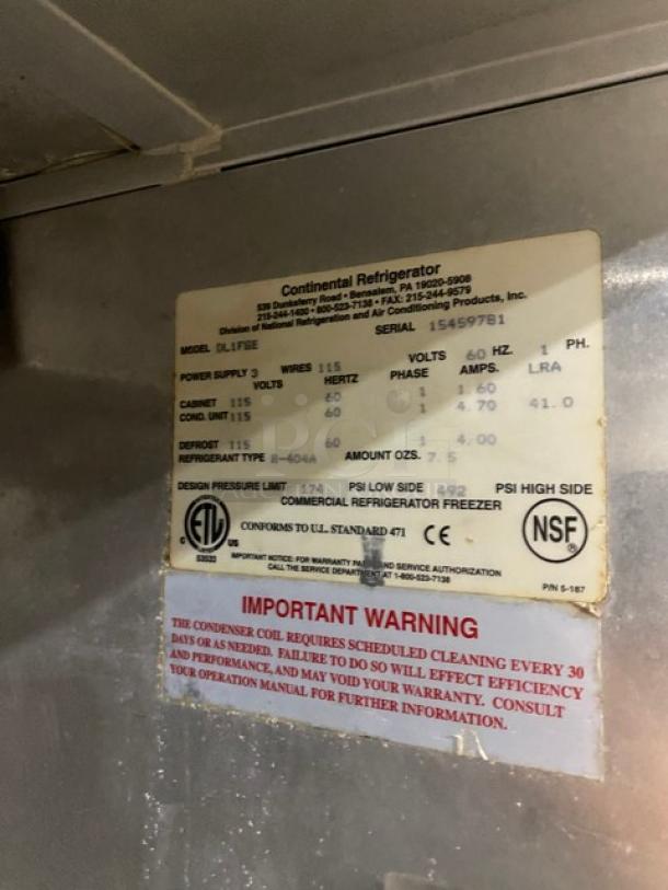 Continental Slim Series One Door Reach In Freezer, Model DL1F6E, Serial 15459781, 115V, 1 Phase, on casters. Tags detail electrical specs and maintenance warning.