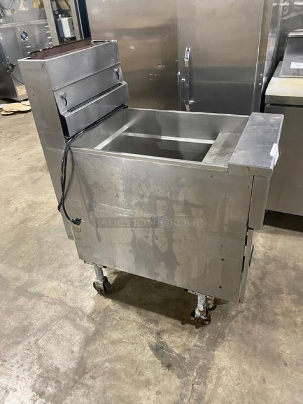 Pitco Soltice Series natural gas commercial deep fryer on casters with digital controls and 5 burners, used condition.
