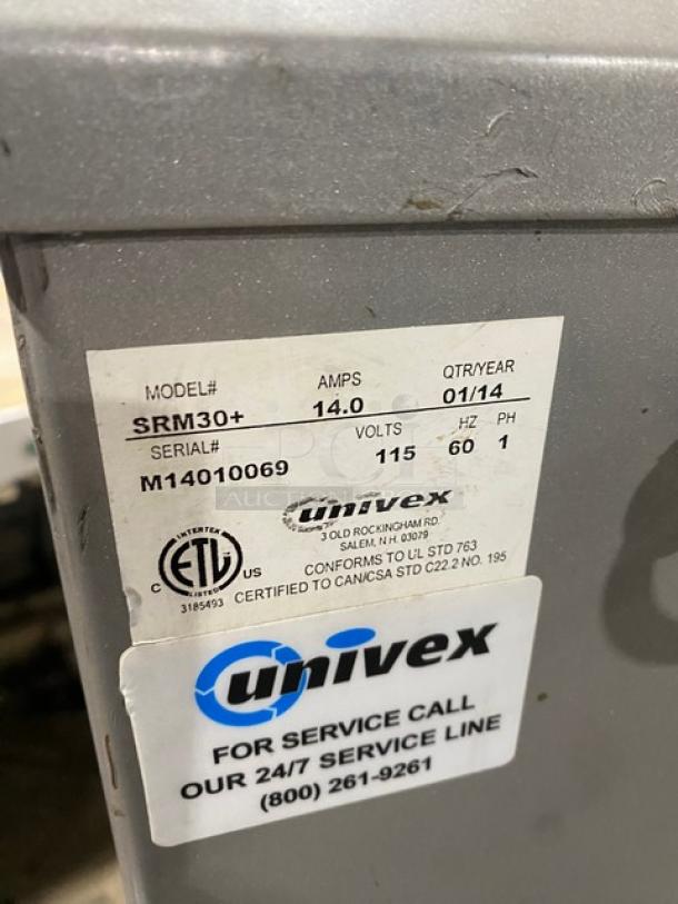 Univex commercial 30 Qt planetary mixer SRM30+. Includes splash guard, stainless steel bowl, dough hook. Model SRM30+, SN: M14010069, 115V, 1 phase.