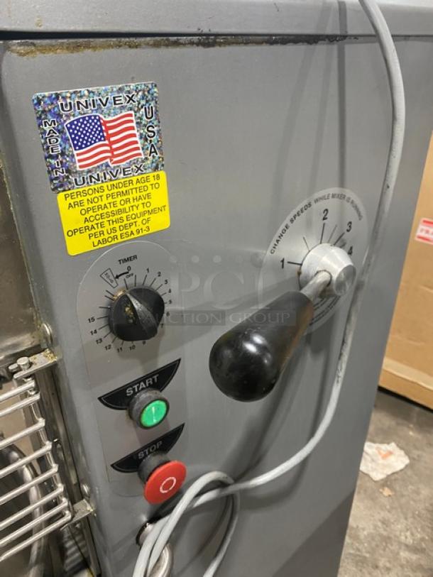 Univex SRM30+ commercial 30 qt planetary mixer with splash guard, stainless steel bowl, dough hook. 115V, 1 phase, on legs.