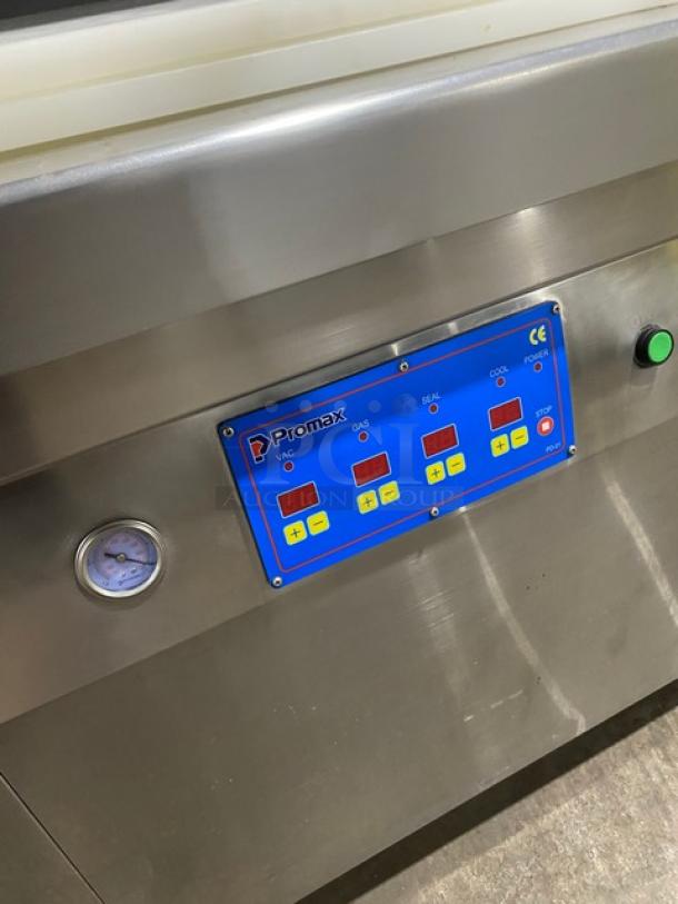 Promax stainless steel electric vacuum tray sealer with digital controls, single chamber, on casters, working condition.