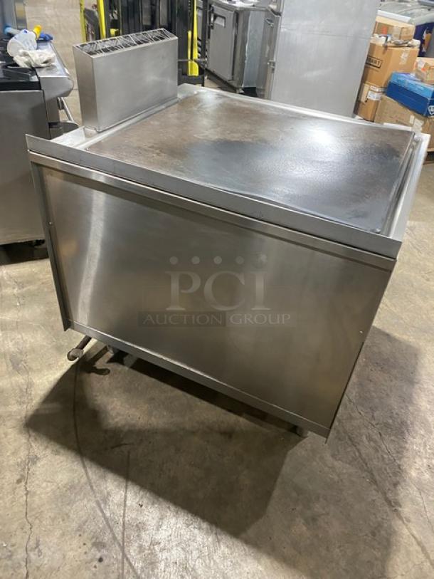 Electrolux Thermaline stainless steel gas flat top grill, back splash, enclosed base, on legs, commercial use.