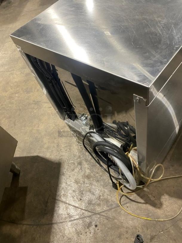 Ecolab stainless steel undercounter low-temp dishwasher, model ULT1, Energy Star certified, includes full-size peg rack.