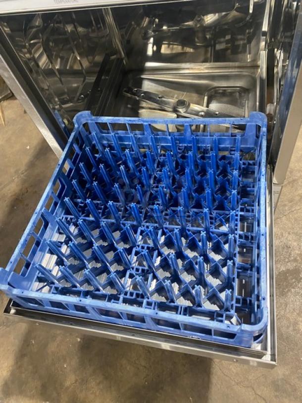 Ecolab ULT1 commercial undercounter dishwasher, stainless steel, Energy Star certified, with full-size blue peg rack.