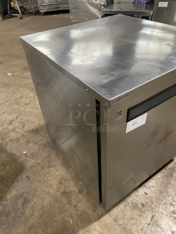 Delfield Stainless Steel Single Door Undercounter Refrigerator, Model 406PSTAR2, with poly-coated wire rack, on casters.