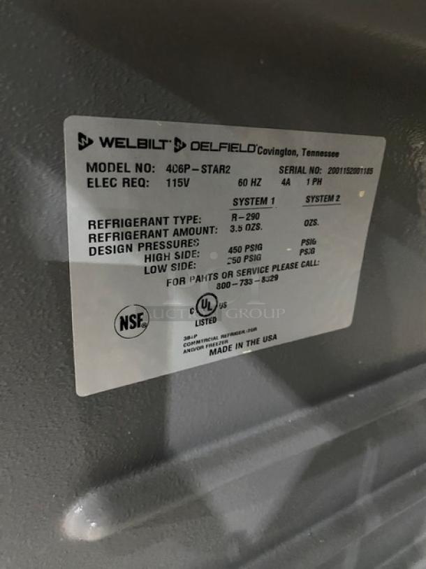 Delfield commercial stainless steel undercounter refrigerator, model 406PSTAR2. Features solid single door, poly coated wire rack, 115V, on casters. NSF and UL listed.