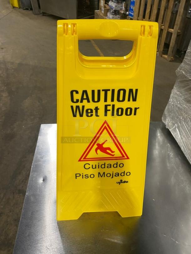 Brand new yellow Update International fold-out caution wet floor sign, model WFS-25, with bilingual text.