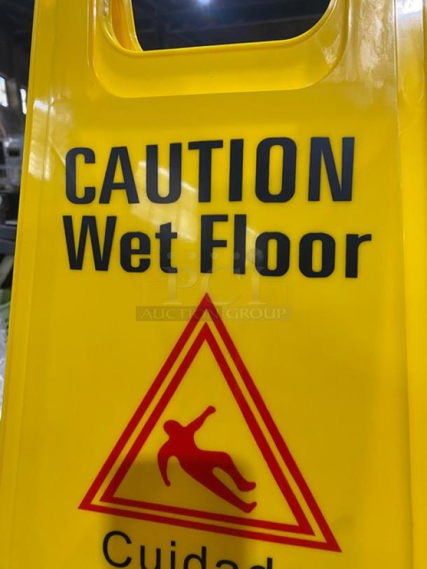 Brand new Update International WFS-25 yellow caution wet floor sign, 24” fold-out style, featuring slip hazard symbol.