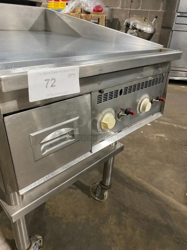Keating stainless steel natural gas countertop griddle with mirror-shine top, thermostatic controls, and splash guards.