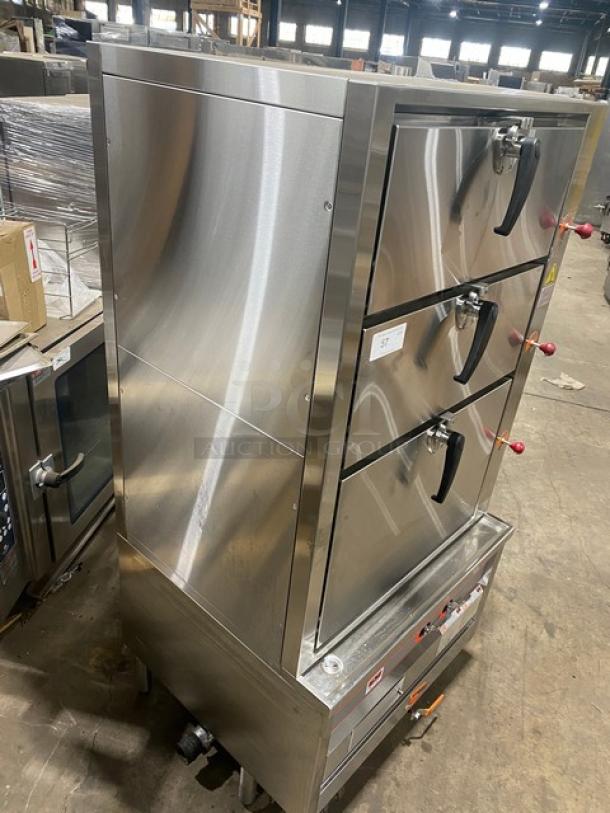Flame-Mate ESC3NN stainless steel 3-compartment steam cabinet, natural gas, on legs, excellent condition.