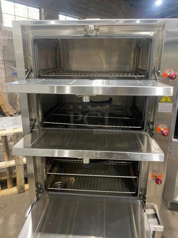Flame-Mate ESC3NN stainless steel gas-powered 3-compartment steam cabinet on legs, open doors, clean condition.