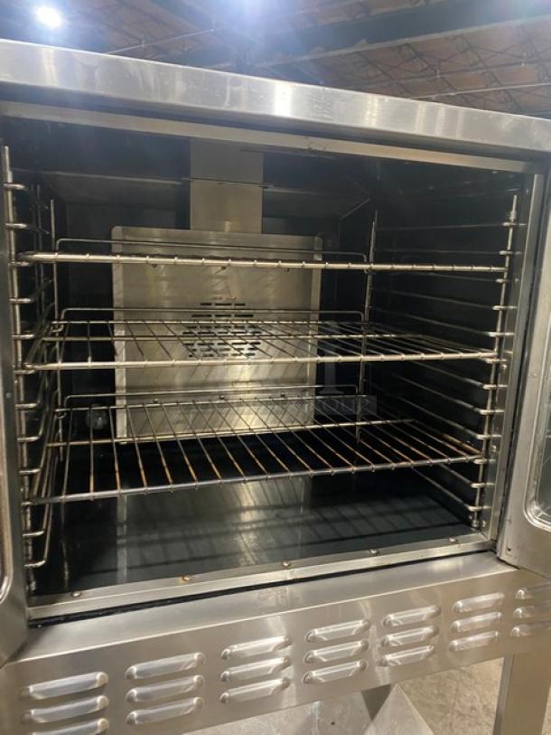 American Range Majestic Series stainless steel convection oven, natural gas powered, includes wired racks, undershelf base, and legs.