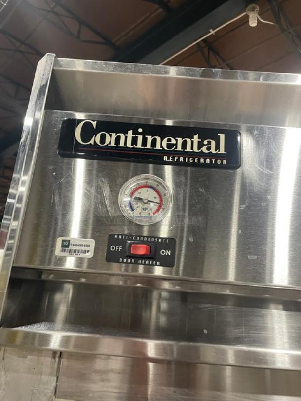 Continental Commercial Stainless Steel Single Door Refrigerator, Model 1R. Features built-in pan slides, anti-condensate switch, and thermometer. On casters, 115V 1 Phase. Serial Number: 155A2371.