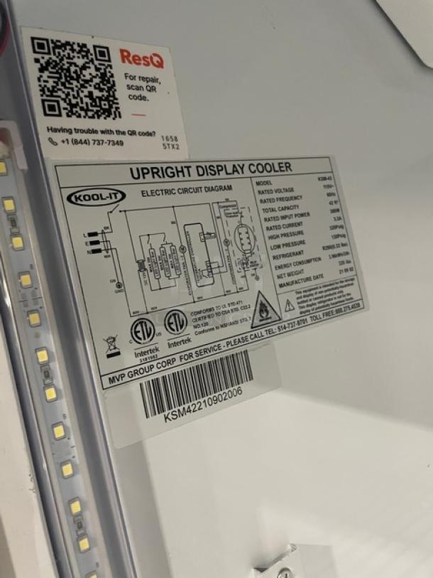 Kool-It KSM42 commercial merchandiser tag with circuit diagram, model info, and serial number KSM42210902006 visible.