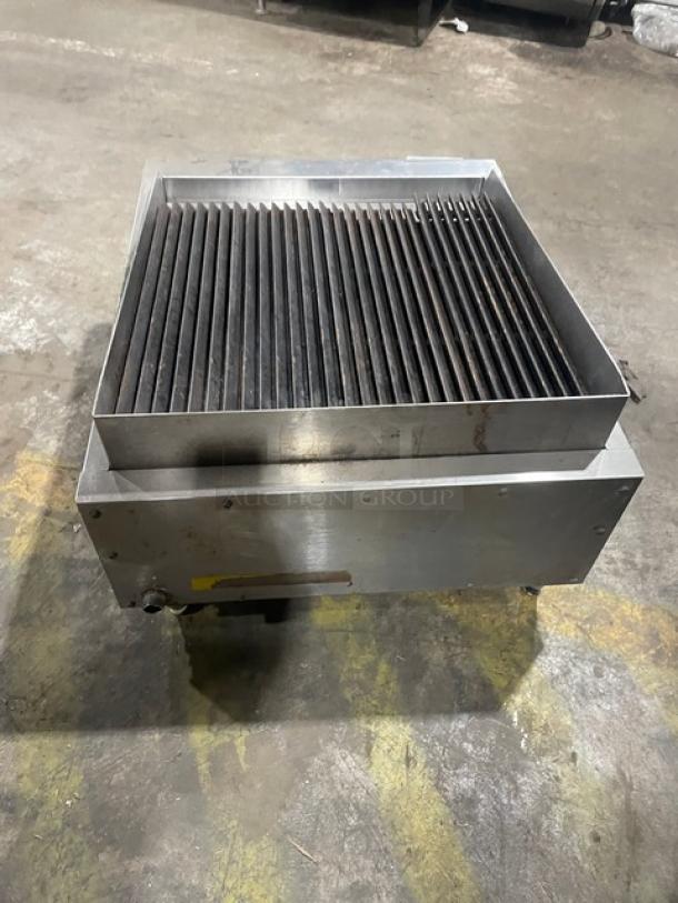 Adcraft CTC-24 stainless steel countertop char broiler, natural gas-powered, on legs, serial number 12130576005.