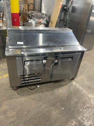 Cooltech 2021 stainless steel 2-door refrigerated prep table, model CTR-60BM, on casters, with poly-coated wire rack.