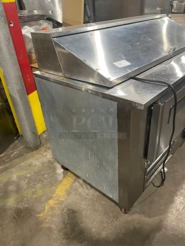 Cooltech 2021 model stainless steel refrigerated prep table, model CTR-60BM, on casters, with poly-coated wire rack.