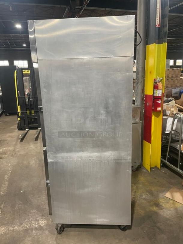 Continental Commercial Stainless Steel Reach-In Dual Temp Refrigerator/Freezer, model 1RF, on casters, with wire racks.