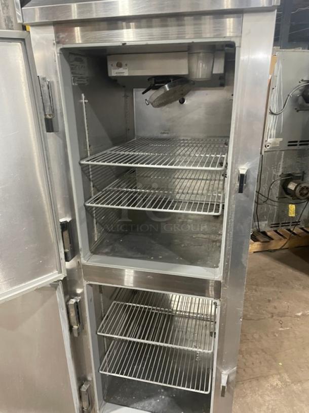 Continental stainless steel half door refrigerator/freezer combo, model 1RF, with poly-coated wire racks, on casters.