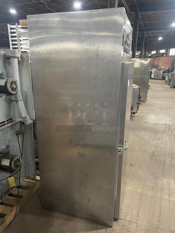 Traulsen stainless steel single door roll-in refrigerator, model ARI134LUTFHS, in used condition, with visible markings.