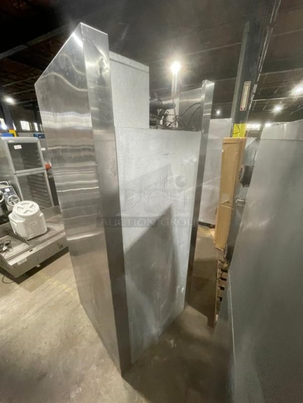 Traulsen stainless steel roll-in refrigerator, model ARI134LUT-FHS, solid single door, commercial-grade, good condition.