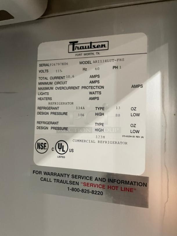 Traulsen commercial stainless steel roll-in refrigerator, model ARI134LUTFHS, serial T26797K06, 115V, 1 phase, NSF certified.