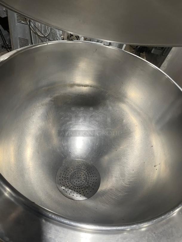 Groen AH140 40-gallon stainless steel steam jacketed kettle. Natural gas, stationary, with knob and faucet; on legs.