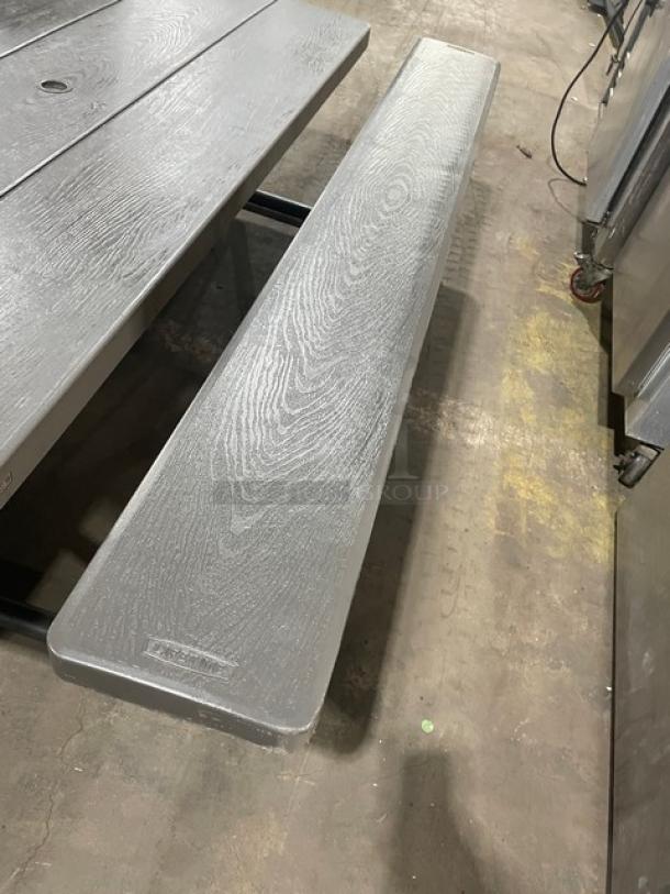 Lifetime commercial grey outdoor picnic table with double-sided bench, wood texture finish, in excellent condition.