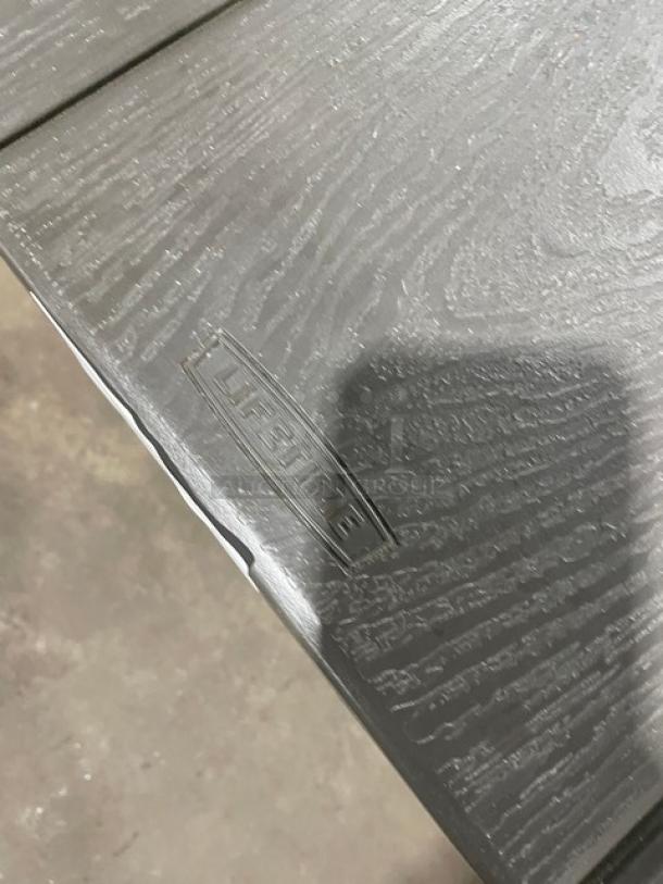 Lifetime commercial grey outdoor picnic table with double-sided bench. Durable design, wood grain texture, Lifetime logo visible.