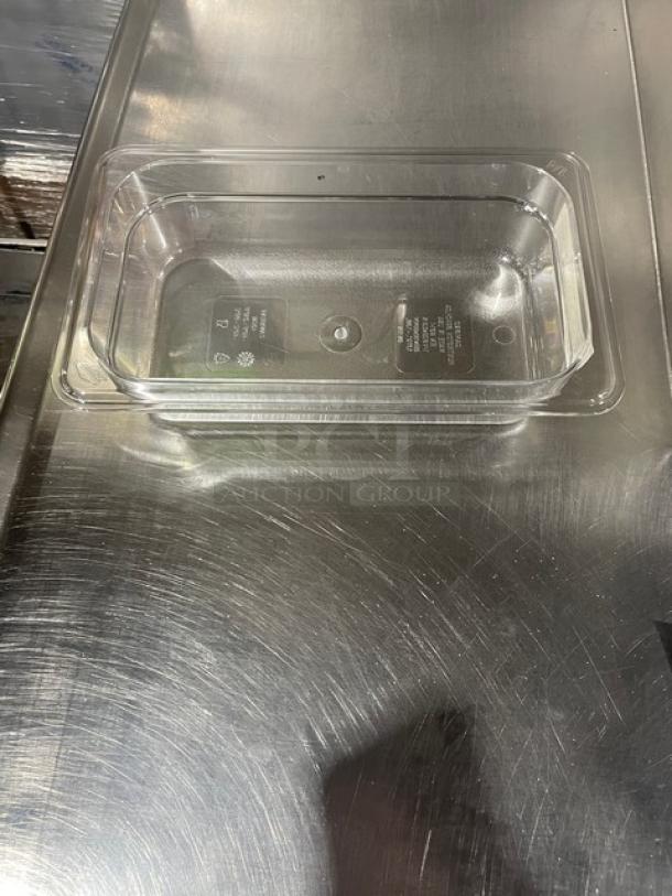 Brand new Cambro Camwear Series clear polycarbonate food pan, 1/4 size, 2" deep, model 42CW135, commercial quality.