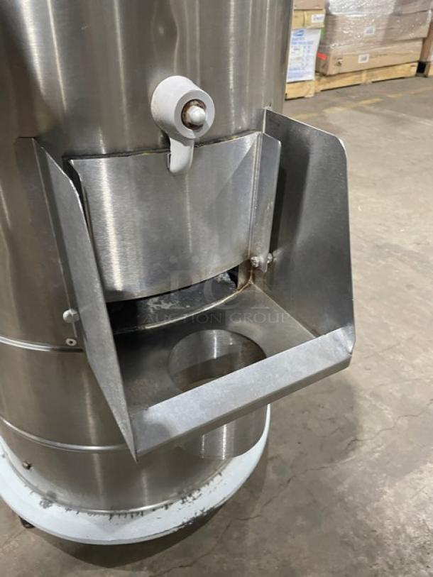 OMCAN Commercial Stainless Steel Electric Potato Peeler, Model PE-BR-0010, on legs, in used condition, 110v.