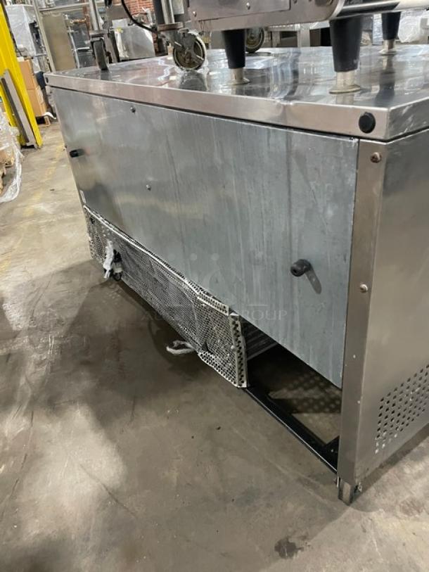True TUC-60F commercial stainless steel two-door under counter freezer on casters, model SN 9131259, 115v, 1 phase.