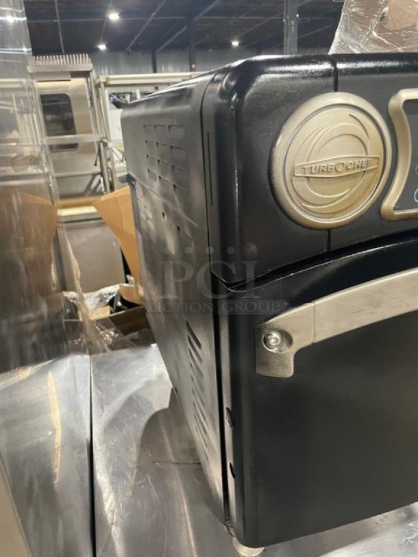 TurboChef Sota Series NGO high-speed commercial oven in black, with digital controls and "TurboChef" emblem, 208/240V, 1 phase, on legs.