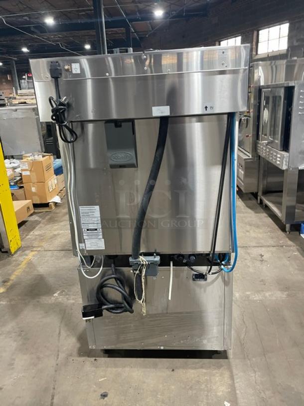 Unox ChefTop MIND.Maps Plus stainless steel combi oven, Model XAVC-06FS-EPR, with built-in hood and touch menu, on casters.
