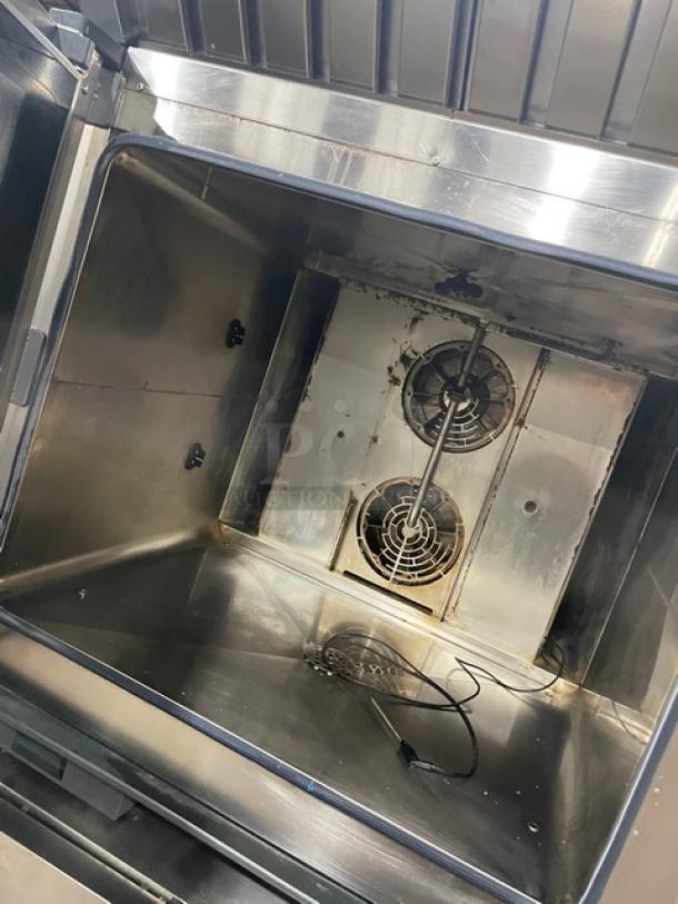 Unox ChefTop MIND.Maps Plus stainless steel combi oven, model XAVC-06FS-EPR, with programmable touch menu and built-in hood.
