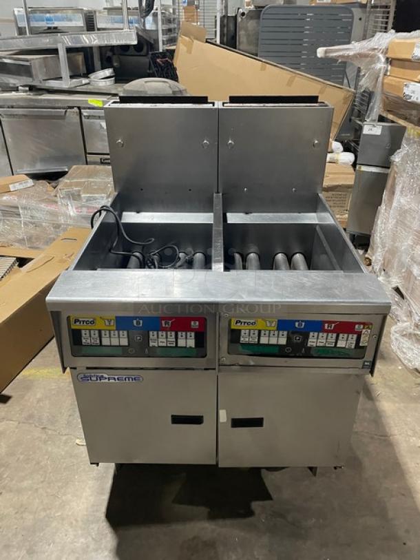 Pitco Solstice Supreme SSH55 commercial fryer, stainless steel, 2-bay, 50lb capacity, natural gas, with backsplash, on casters.