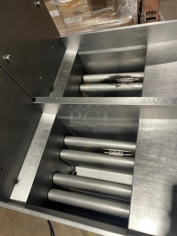 Pitco Solstice Supreme Series SSH55 2-bay 50lb deep fat fryer in stainless steel with backsplash, on casters. Natural gas powered, 115V.
