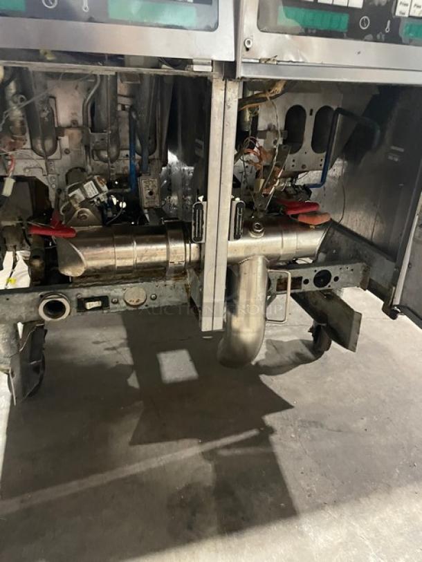 Pitco Solstice Supreme SSH55 commercial stainless steel natural gas 2-bay fryer, 50 lb. capacity, with backsplash and on casters.