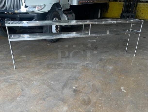 Commercial 10' double overhead shelf, stainless steel, heavy-duty construction. Ideal for industrial kitchens. Excellent condition.